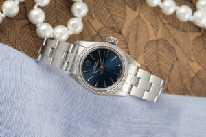 Rolex Oyster Perpetual steel / white gold automatic Kal. 2130 Ref. 67180