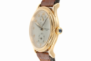 Patek Philippe Travel Time 18 ct gold manual winding Kal. 215/156 Ref. 4864J-010
