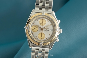 Breitling Chronomat chronograph steel / gold automatic Kal. B13 Ref. D13048