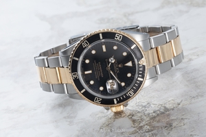 Rolex Submariner steel / gold automatic Kal. 3035 Ref. 16803