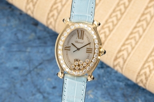 Chopard Happy Sport 18 ct gold quartz Ref. 27/7000-23/11