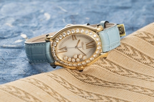 Chopard Happy Sport 18 ct gold quartz Ref. 27/7000-23/11