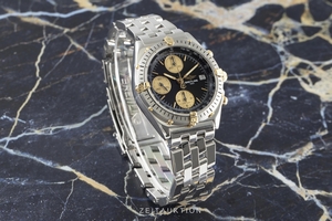 Breitling Chronomat chronograph steel / gold automatic Kal. B13 Ref. B13048