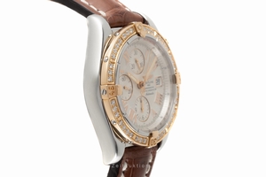 Breitling Chronomat chronograph steel / gold automatic Kal. B13 Ref. C13356
