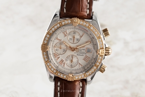 Breitling Chronomat chronograph steel / gold automatic Kal. B13 Ref. C13356