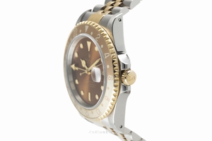 Rolex GMT Master II steel / gold automatic Kal. 3185 Ref. 16713