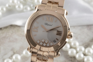 Chopard Happy Sport 18 ct red gold quartz Ref. 277472-5001