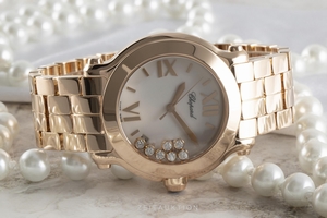 Chopard Happy Sport 18 ct red gold quartz Ref. 277472-5001