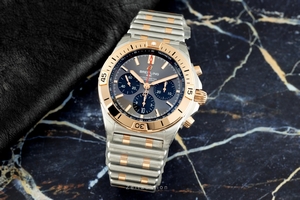 Breitling Chronomat chronograph steel / gold automatic Kal. B01 Ref. UB0134101B1U1