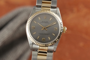Rolex Oyster Perpetual steel / gold automatic Kal. 2130 Ref. 67513